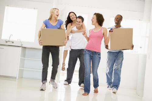 Loading household items into a removal truck