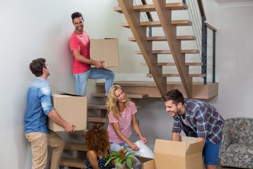 Removalists handling furniture move in a Mitcham home