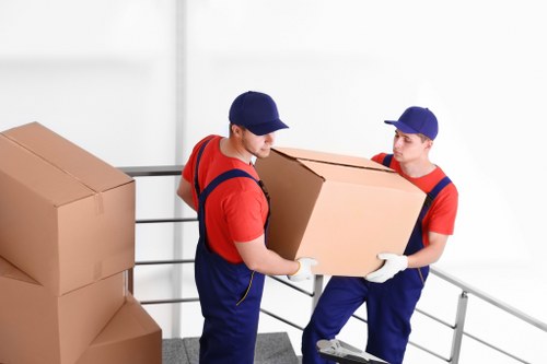 Packed boxes and furniture ready for local storage