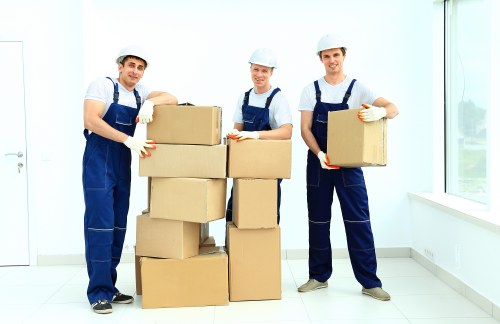Professional moving truck service handling furniture loading in Mitcham