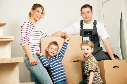 Man with van loading furniture for a local move in Mitcham