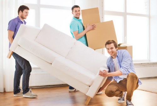 Packed moving boxes and furniture ready for removals in Mitcham
