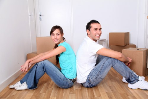 Local team removing old sofas and furniture from a Mitcham home