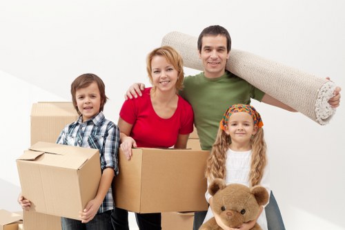 Packed office equipment and furniture ready for commercial transport