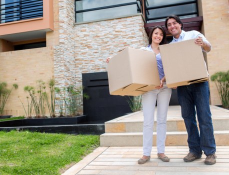 Packed boxes and household items ready for a local flat removal